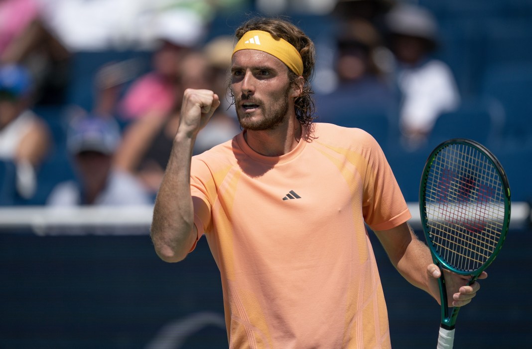 Stefanos Tsitsipas celebrates a point won at the 2024 Cincinnati Open.