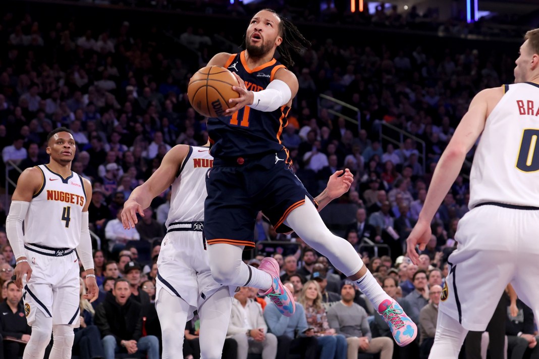 Knicks star Jalen Brunson takes a shot against the Nuggets during the 2024-25 NBA season.