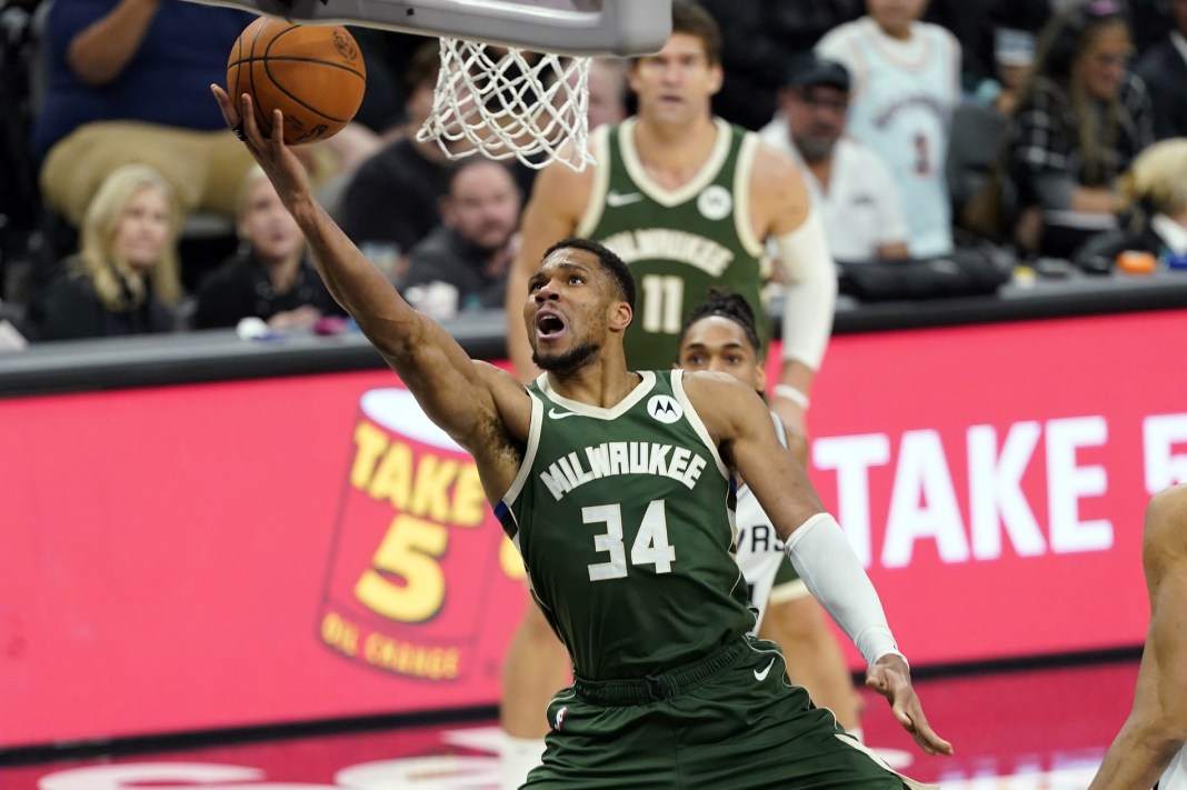 Bucks star Giannis Antetokounmpo lays the ball in against the Spurs during the 2024-25 NBA season.