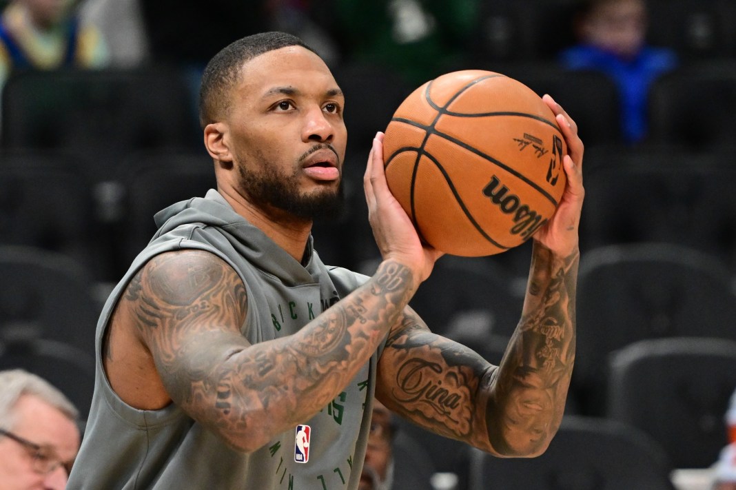 Bucks star Damian Lillard warms up against the Warriors during the 2024-25 NBA season.