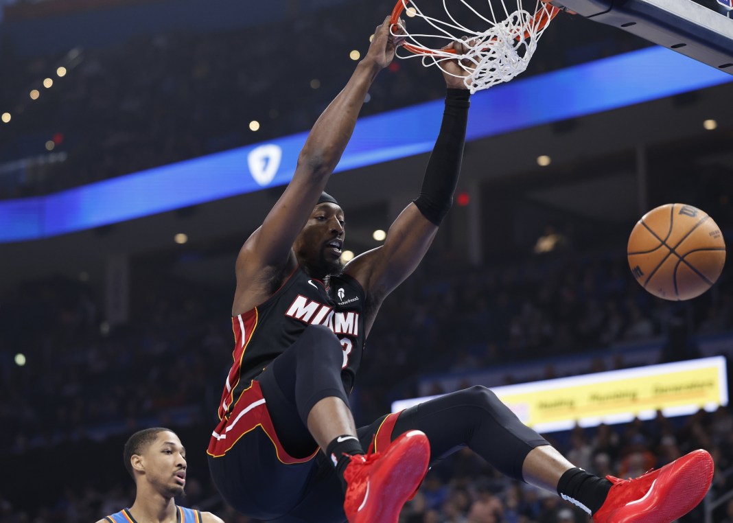 Heat star Bam Adebayo dunks against the Thunder during the 2024-25 NBA season.