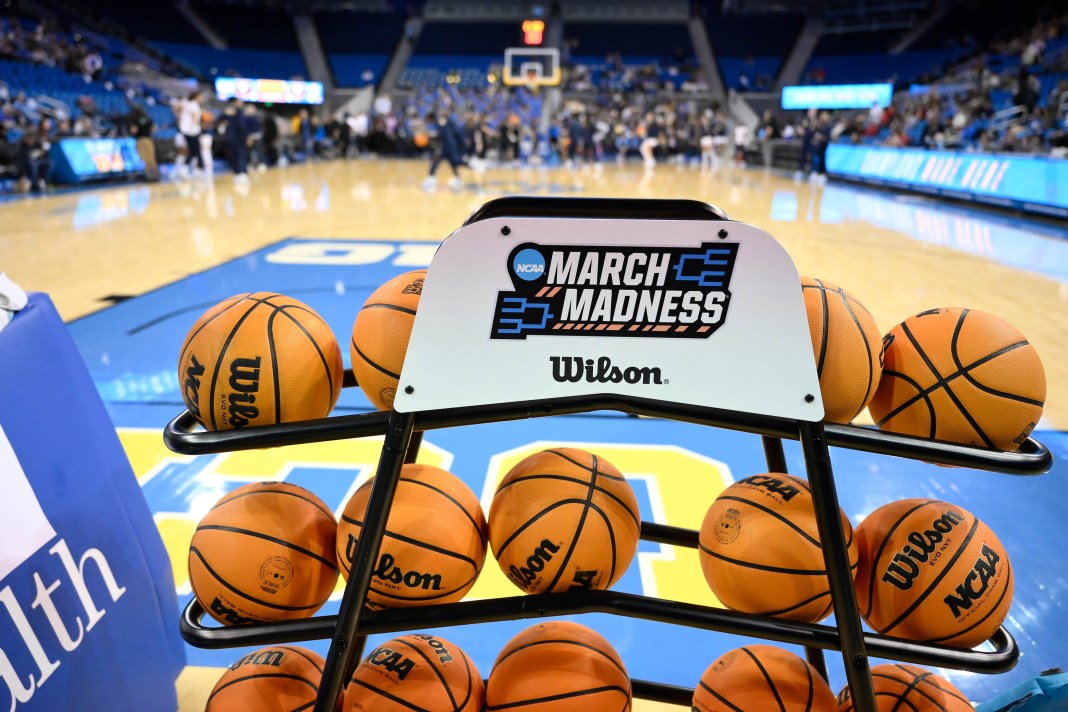 A rack of basketballs with the March Madness logo before the start of the UCLA Bruins vs. Ohio State Buckeyes game at Pauley Pavilion presented by Wescom on February 5, 2025.