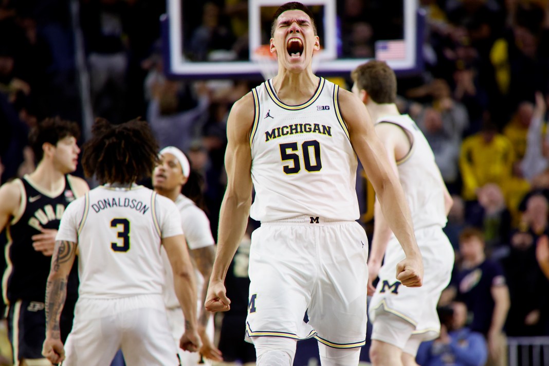 Michigan Wolverines center Vladislav Goldin (50) celebrates during the second half against the Purdue Boilermakers at Crisler Center on February 11, 2025.